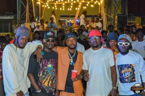 A group of guests posing together at Hood Party