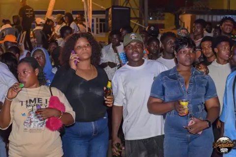 Party guests gathered together in the crowd