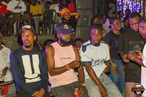 Friends posing together at Hood Party