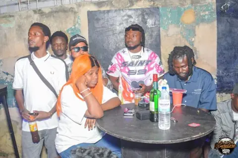 Hood Party event photograph showing guests and the live atmosphere