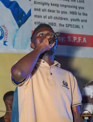 Hood Party event photograph showing a performer or guest at the event