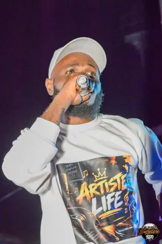 Hood Party event photograph showing a performer or guest at the event
