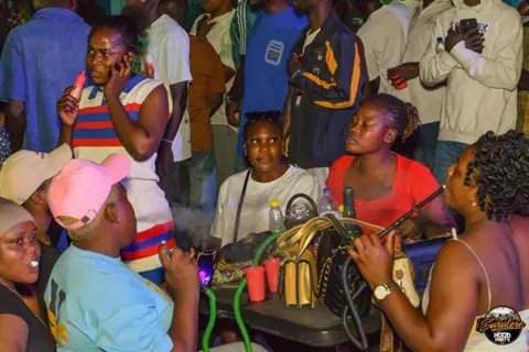 Hood Party event photograph showing guests and the live atmosphere