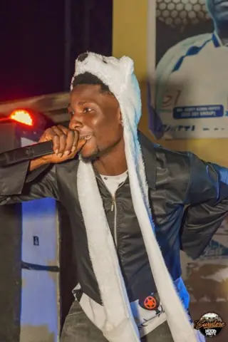 Hood Party event photograph showing a performer or guest at the event