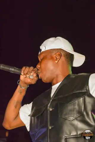Hood Party event photograph showing a performer or guest at the event