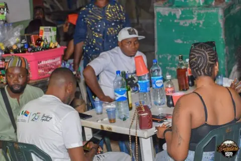 Hood Party event photograph showing guests and the live atmosphere