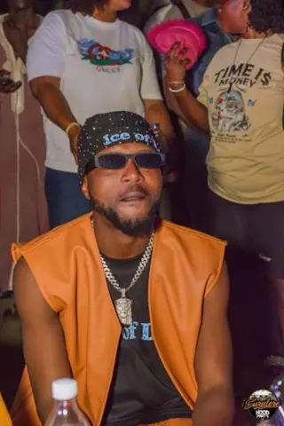 Hood Party event photograph showing a performer or guest at the event