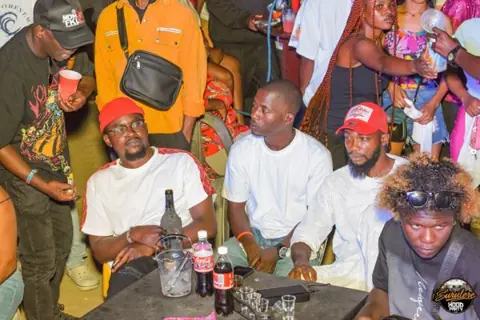 Hood Party event photograph showing guests and the live atmosphere