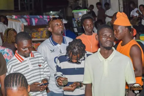Hood Party event photograph showing guests and the live atmosphere