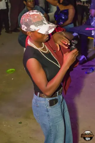 Hood Party event photograph showing a performer or guest at the event
