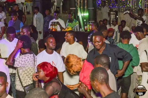 Hood Party event photograph showing guests and the live atmosphere