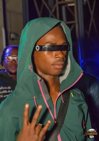 Hood Party event photograph showing a performer or guest at the event