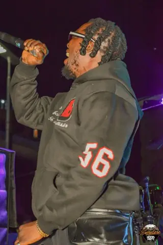 Hood Party event photograph showing a performer or guest at the event