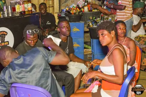 Hood Party event photograph showing guests and the live atmosphere